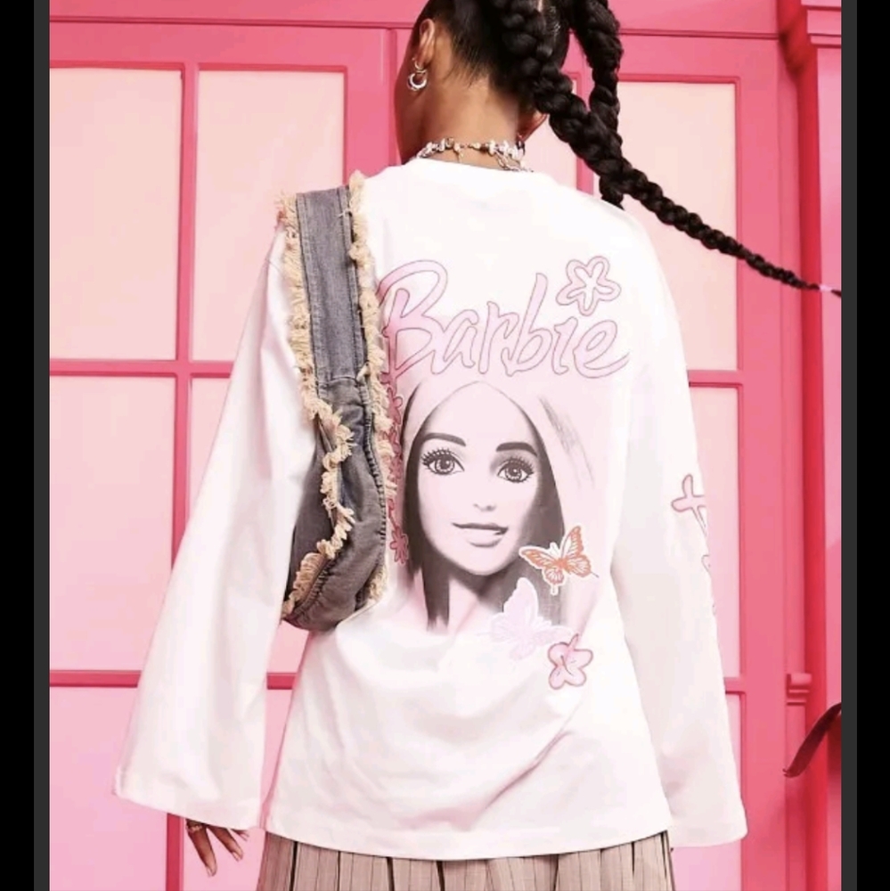 ASOS DESIGN Curve Barbie oversized wide sleeve T-shirt with lic graphic print. S